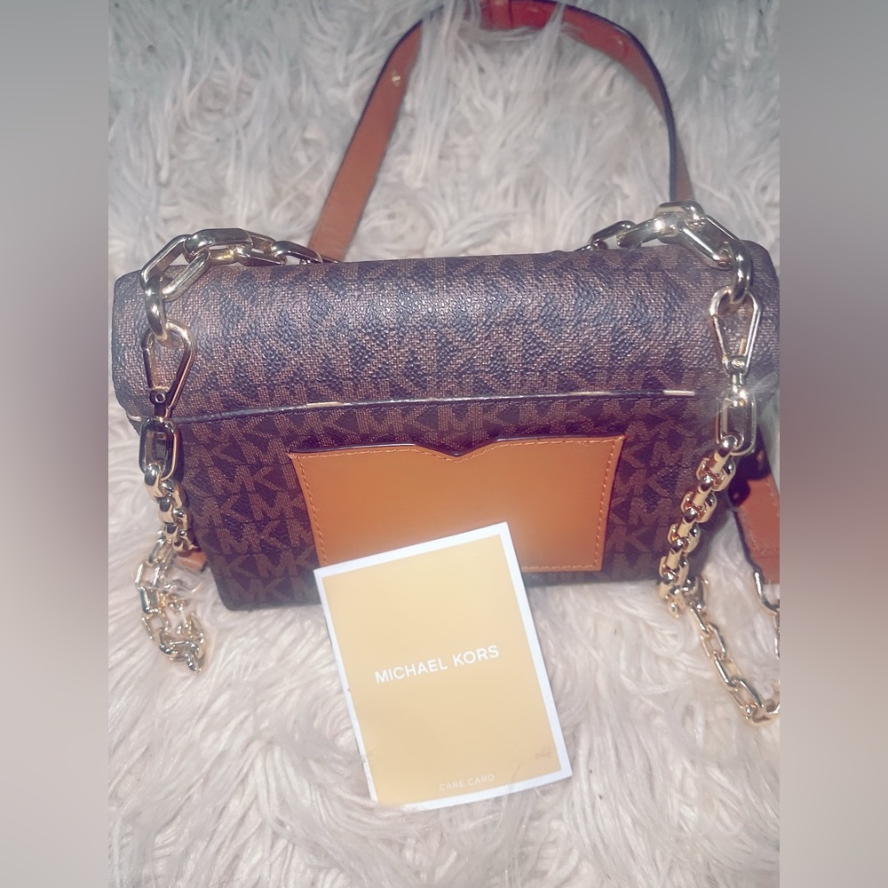 Very cute small  dark brown Micheal Kors small purse